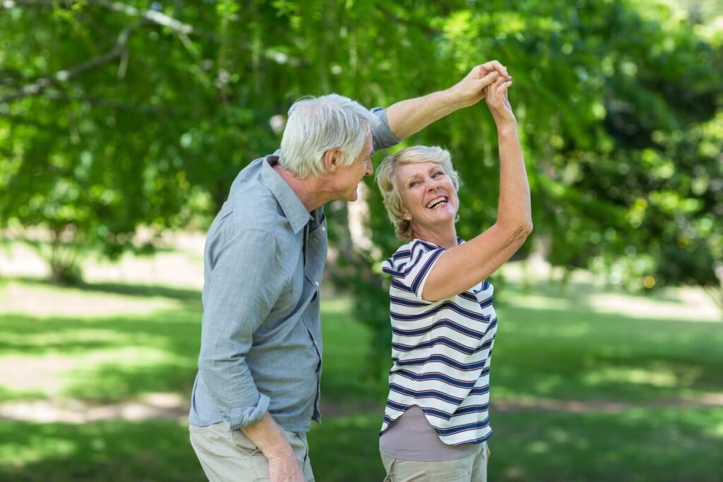 East Ridge Residence | Senior couple dancing in the park